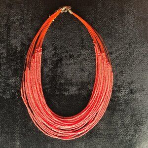25 strand red necklace, seed beads and lobster claw clasp